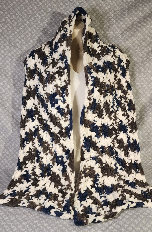 Keep warm and cozy with this White, Blue, and Grey crocheted scarf