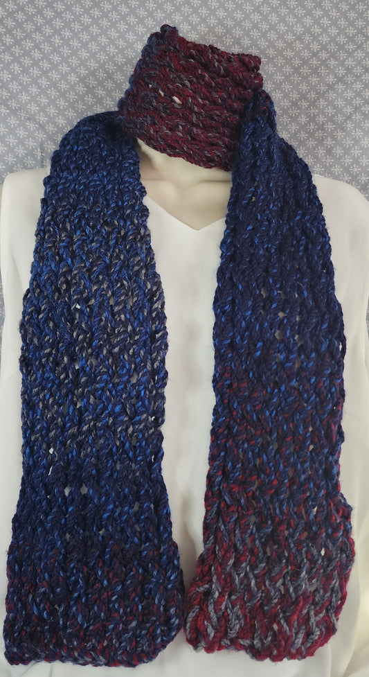 Finger Knitted Scarf | Keep warm in with this cozy red and blue scarf.